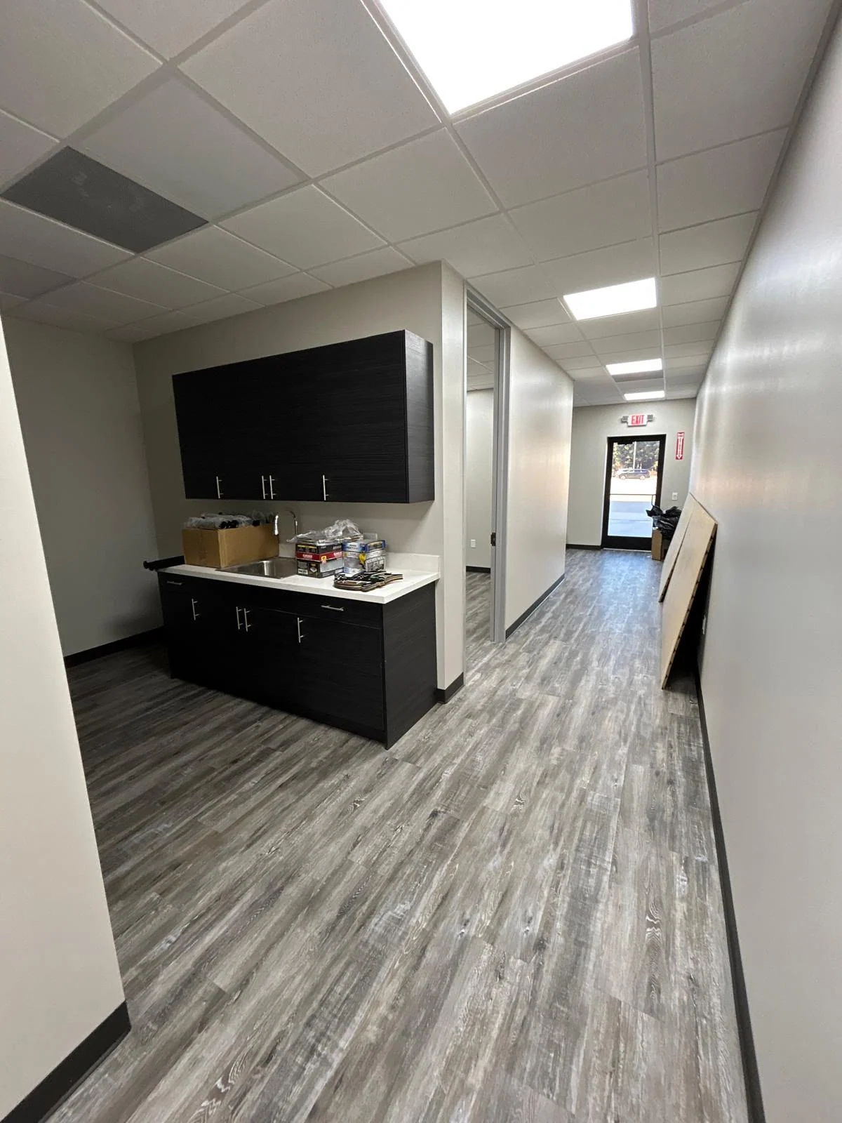 Commercial break room with new lighting and power by LL General Contractor